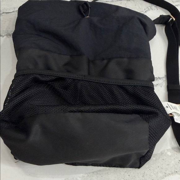 Lululemon Black Tote Crossbody Bag with gold accents.  Excellent condition. - Picture 9 of 11